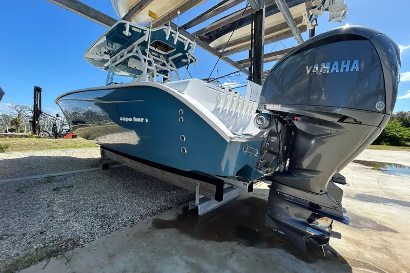 Slide: The Image of 2022 Cape Horn 36 boat with Yamaha engine on a lift, side view. - 46