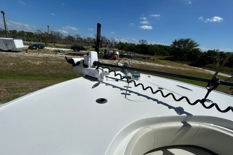 Slide: The Image of 2022 Cape Horn 36 boat deck with Minn Kota trolling motor under clear blue sky. - 7