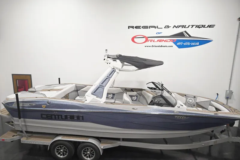 Slide: The Image of 2026 Centurion Nv243 boat on trailer at Regal & Nautique of Orlando showroom. - 3