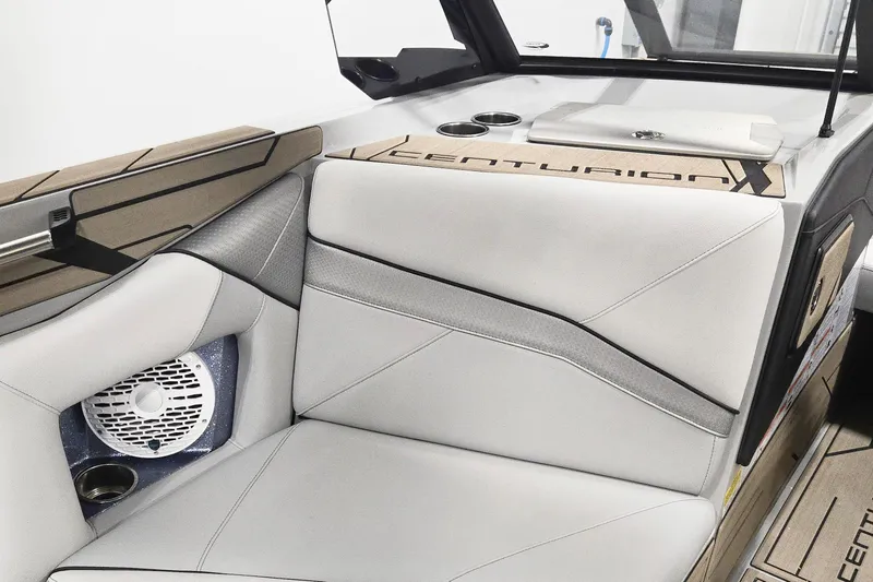 Slide: The Image of 2026 Centurion Nv243 boat interior with sleek seating and integrated speaker system. - 7