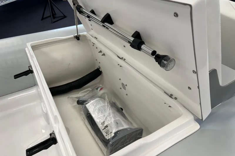 Slide: The Image of 2023 AB Inflatables Mares 12 VSX storage compartment with equipment inside. - 6