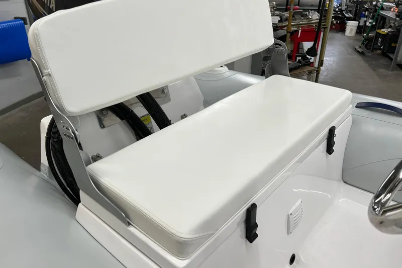 Slide: The Image of 2023 AB Inflatables Mares 11 VSX boat seat with white cushioned backrest. - 6