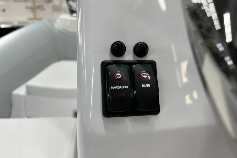 Slide: The Image of Close-up of 2023 AB Inflatables Mares 11 VSX navigation and bilge switches. - 9
