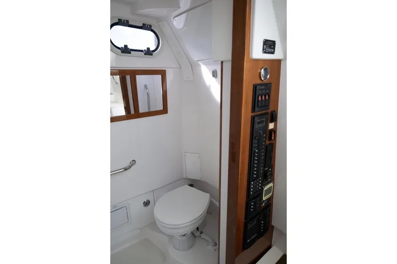Slide: The Image of Interior cabin of 2016 Hunt Yachts 32 Center Console, featuring a compact and modern design. - 45