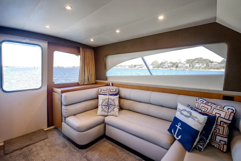 Slide: The Image of Luxurious interior of 2007 Luhrs Tournament 360 Open yacht with plush seating and nautical decor. - 10