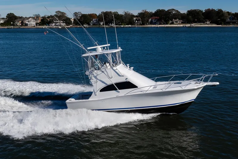 Slide: The Image of 2007 Luhrs Tournament 360 Open cruising on blue water, showcasing sleek design and performance. - 25