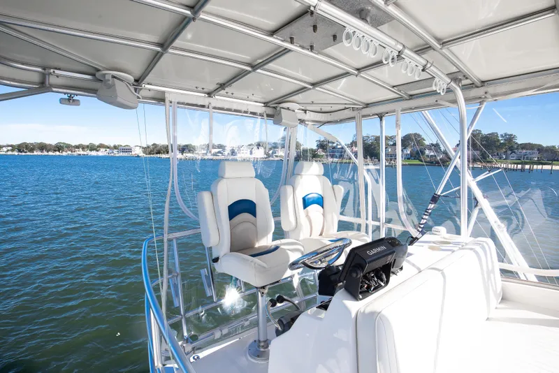 Slide: The Image of 2007 Luhrs Tournament 360 Open boat helm with ocean view and modern seating. - 6