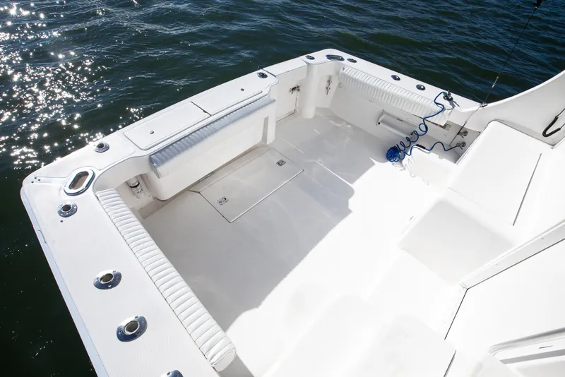 Slide: The Image of 2007 Luhrs Tournament 360 Open boat deck with seating and rod holders. - 7