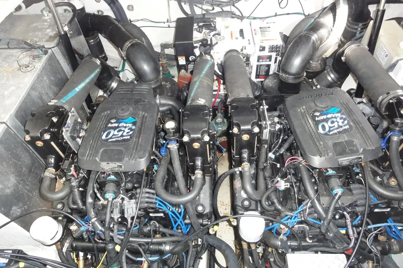 Slide: The Image of Engine room of 2007 Sea Ray 320 Sundancer with twin MerCruiser 350 MAG engines. - 21