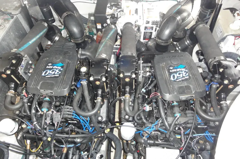 Slide: The Image of Engine compartment of a 2007 Sea Ray 320 Sundancer with twin MerCruiser 350 MAG MPI engines. - 24