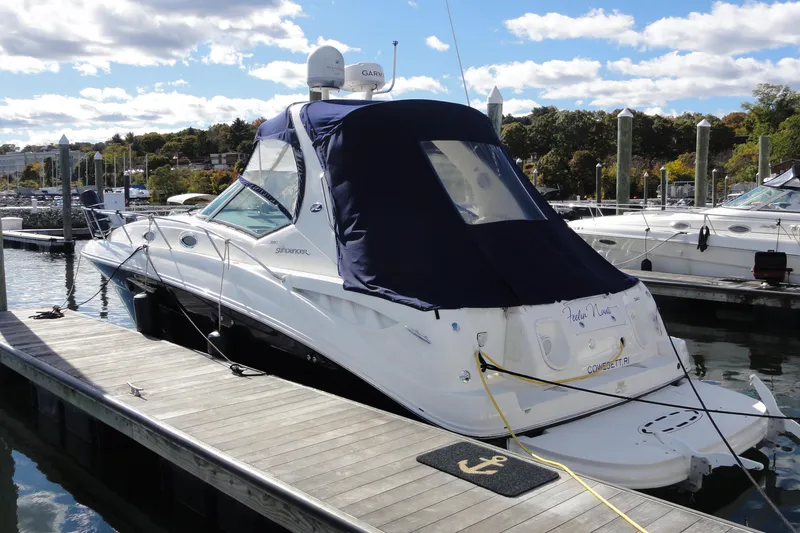 Slide: The Image of 2007 Sea Ray 320 Sundancer docked at marina under clear skies. - 3