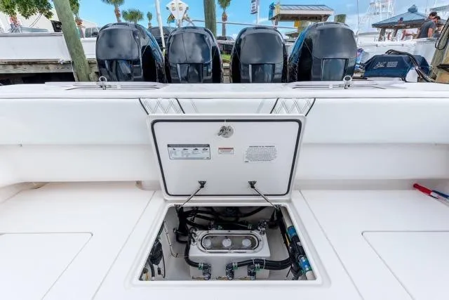 Slide: The Image of 2020 Contender 44 ST boat interior with white seating and waterfront view. - 22