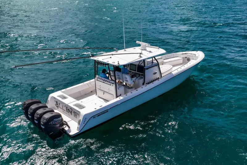 Slide: The Image of Aerial view of 2020 Contender 44 ST boat docked beside another vessel. - 34