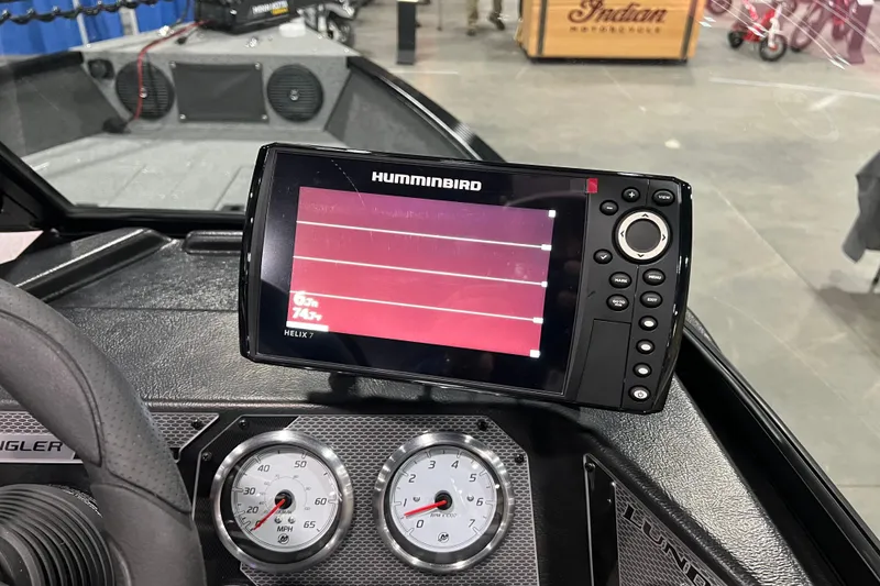 Slide: The Image of 2024 Lund 1650 Angler Sport dashboard with Humminbird Helix 7 fish finder and gauges. - 11