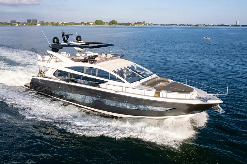 The Image of Luxurious 2020 Pearl 80 yacht cruising on open water, showcasing sleek design and elegance. - 0