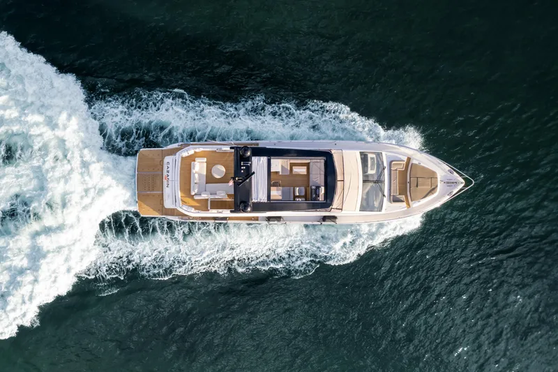 Slide: The Image of Aerial view of 2020 Pearl 80 yacht cruising on open water. - 14