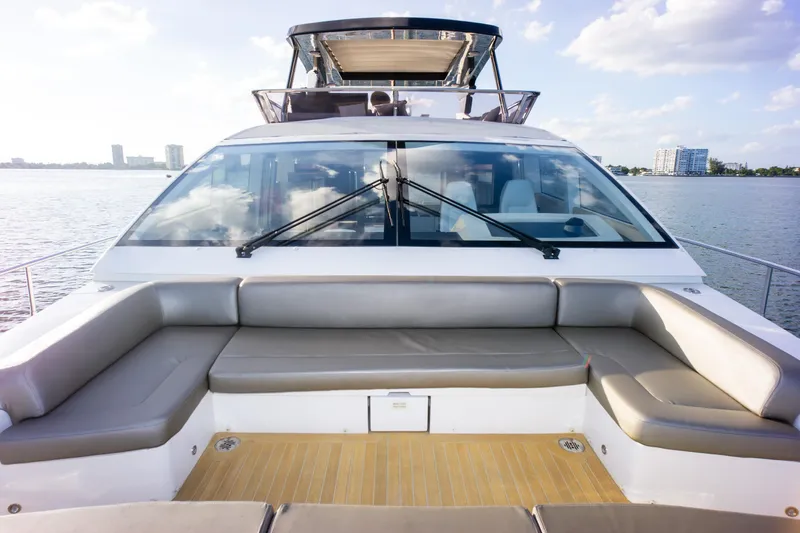 Slide: The Image of Luxury Pearl 80 yacht deck with seating, 2020 model, on calm waters. - 41