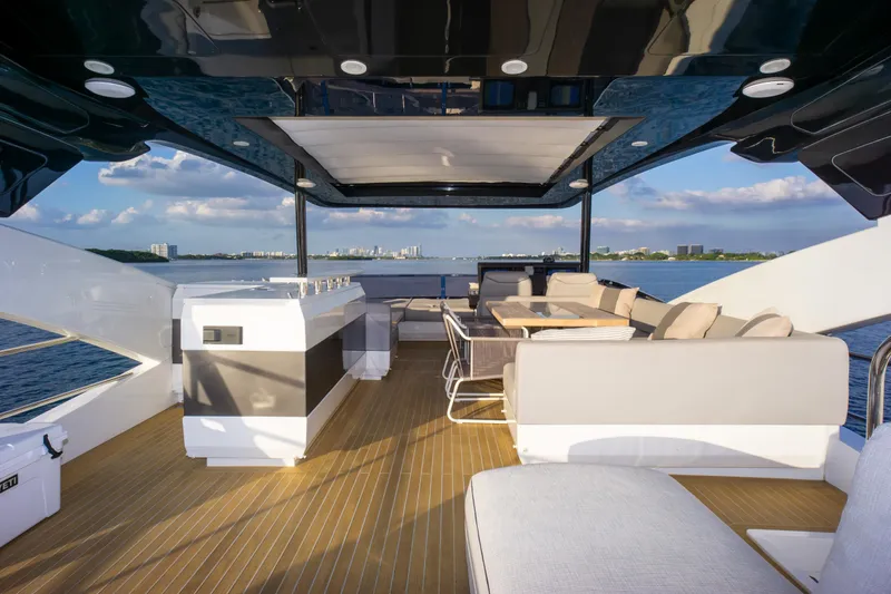 Slide: The Image of Luxurious Pearl 80 yacht deck with seating and ocean view, 2020 model. - 45