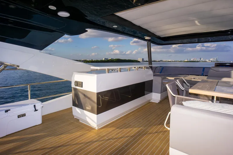 Slide: The Image of Luxurious Pearl 80 yacht deck with seating, ocean view, and modern design, 2020 model. - 46