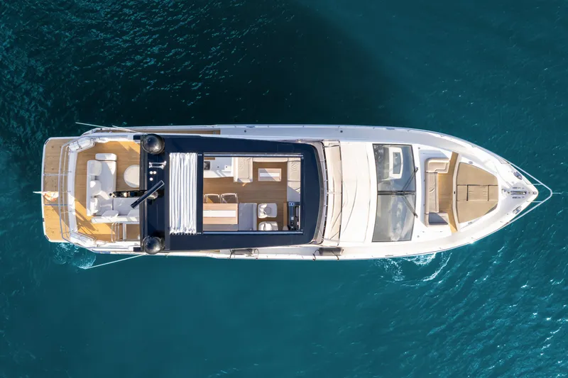 Slide: The Image of Aerial view of 2020 Pearl 80 yacht on clear blue water. - 8