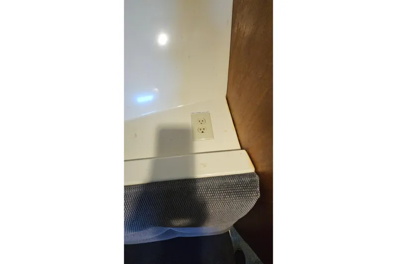 Slide: The Image of Power outlet on 1988 Albin 34 Cruiser interior wall. - 51