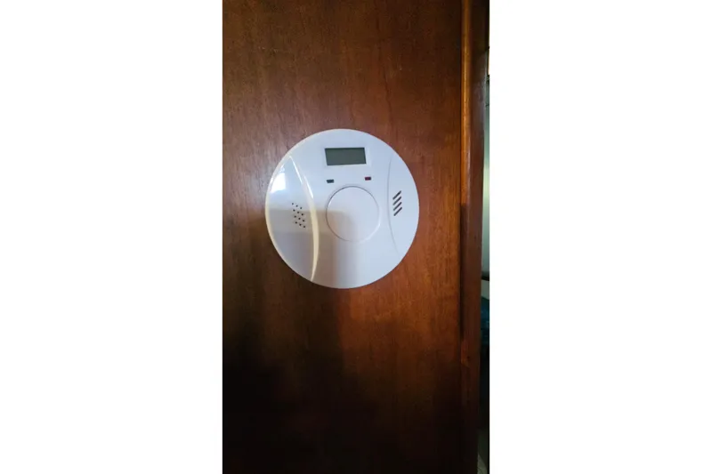 Slide: The Image of Smoke detector on wooden wall inside 1988 Albin 34 Cruiser boat. - 52