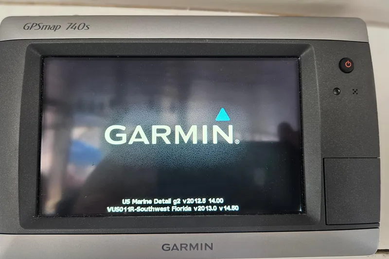 Slide: The Image of Garmin GPSmap 740s display on 1988 Albin 34 Cruiser, showing marine navigation details. - 65