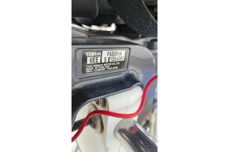 Slide: The Image of Yamaha motor label on Albin 34 Cruiser, 1988 model, showing serial number and origin. - 75