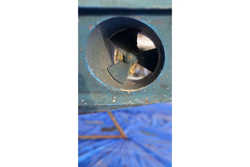 Slide: The Image of Close-up of a 1988 Albin 34 Cruiser's bow thruster in dry dock. - 86