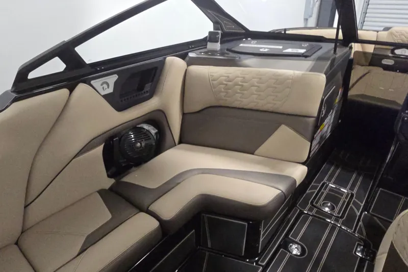 Slide: The Image of Luxurious interior of 2026 Centurion R1245 boat with beige and black seating. - 12