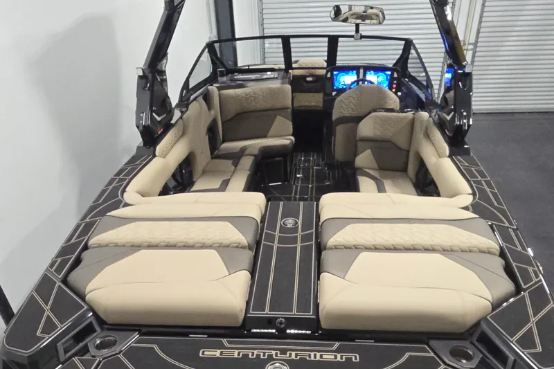 Slide: The Image of Luxurious interior of 2026 Centurion R1245 boat with plush seating and modern dashboard. - 8