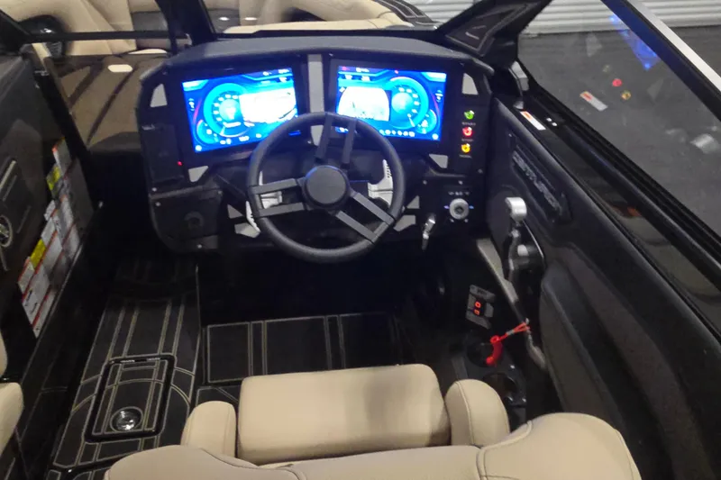 Slide: The Image of Modern Centurion R1245 boat dashboard with digital displays and steering wheel, 2026 model. - 6