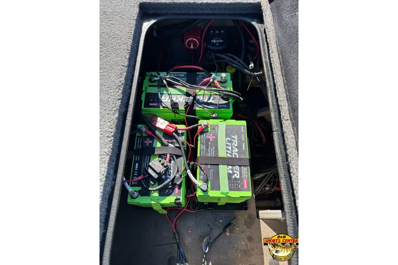 Slide: The Image of 2021 Ranger RT198P boat battery compartment with green Tracer lithium batteries and wiring. - 10