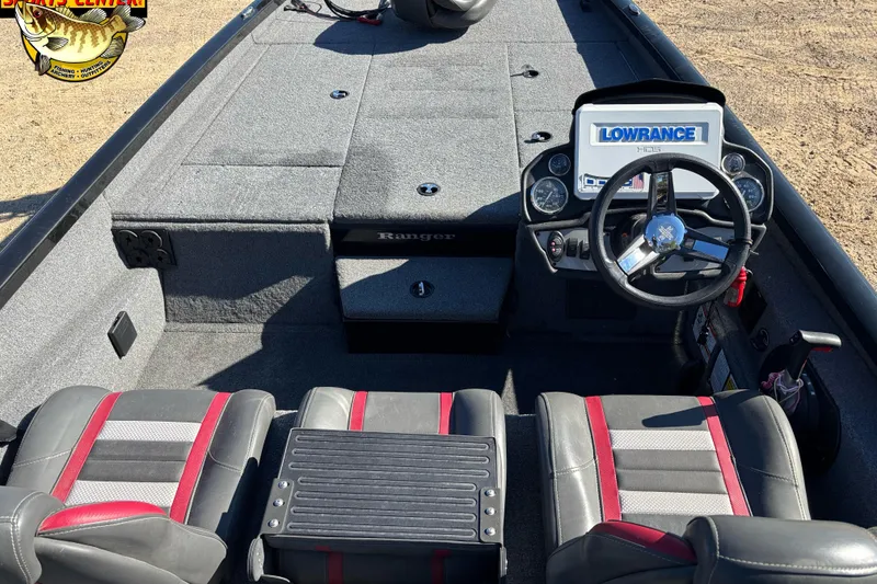 Slide: The Image of 2021 Ranger RT198P boat interior with steering console and seating. - 7