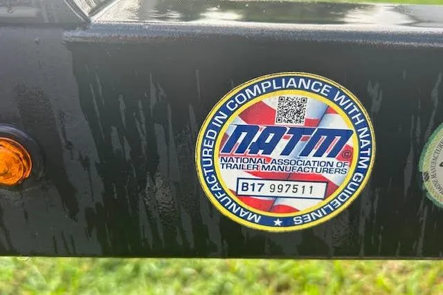 Slide: The Image of Sticker on 2019 Sun Tracker Fishin' Barge 20 DLX, NATM compliance label with serial number B17 997511. - 14
