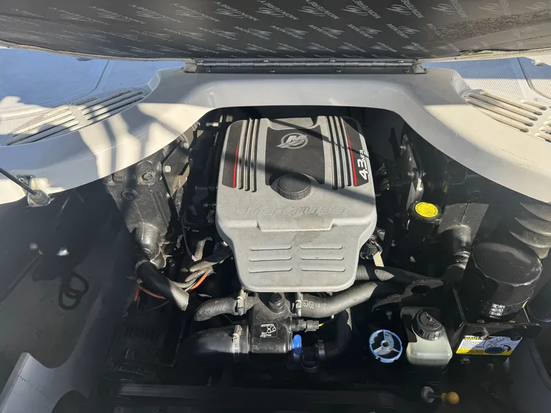Slide: The Image of Engine compartment of a 2009 Monterey 194FS boat, featuring a MerCruiser 4.3L engine. - 32