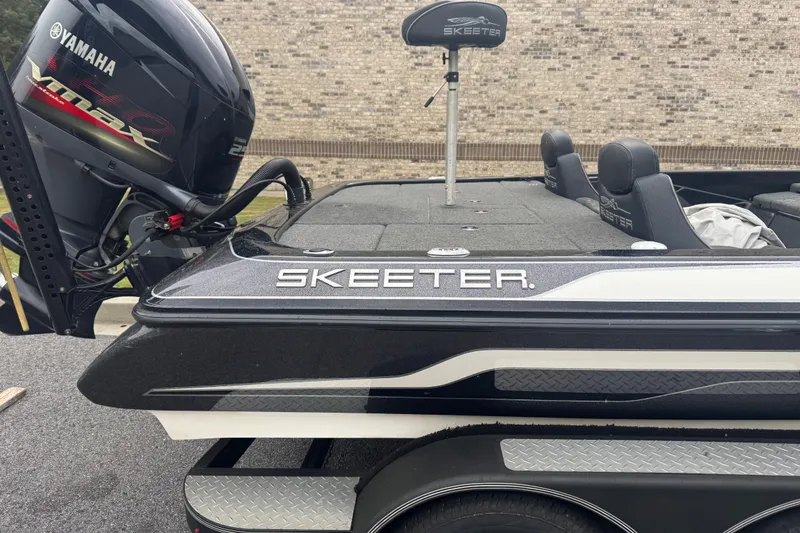 Slide: The Image of 2019 Skeeter ZX250 boat with Yamaha VMAX engine, side view. - 1