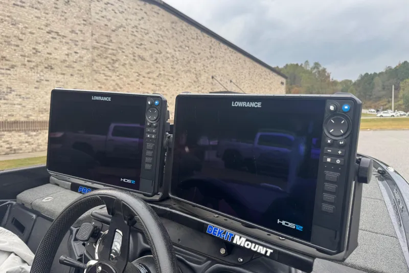 Slide: The Image of Dual Lowrance HDS12 displays on 2019 Skeeter ZX250 boat dashboard. - 3