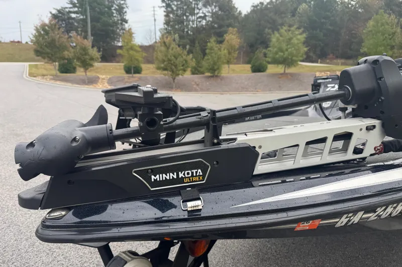 Slide: The Image of Minn Kota Ultrex motor on 2019 Skeeter ZX250 boat, parked on a road. - 7