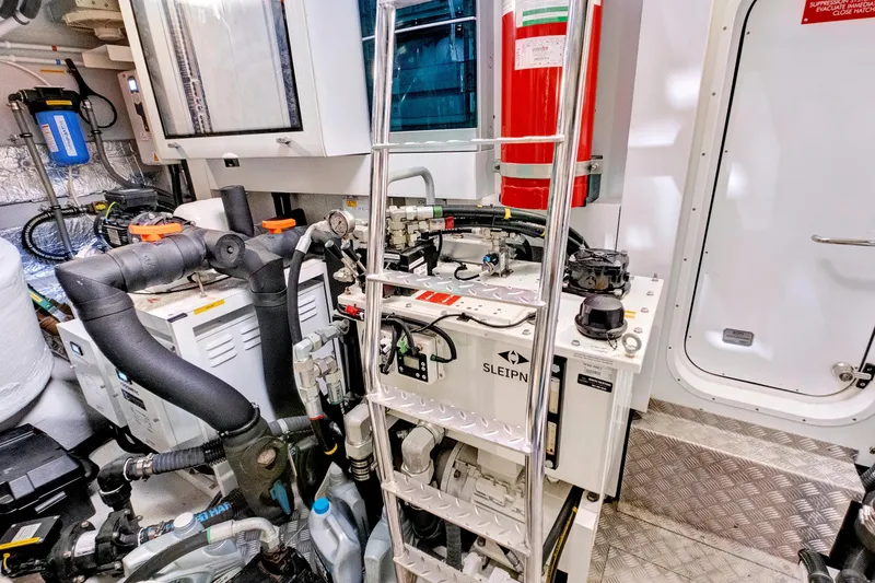 Slide: The Image of Engine room of 2024 Sunseeker 76 Yacht, featuring advanced machinery and equipment. - 105