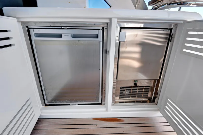 Slide: The Image of Built-in appliances on 2024 Sunseeker 76 Yacht, featuring sleek stainless steel design. - 33