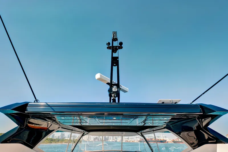 Slide: The Image of 2024 Sunseeker 76 Yacht with sleek design and advanced navigation equipment. - 37