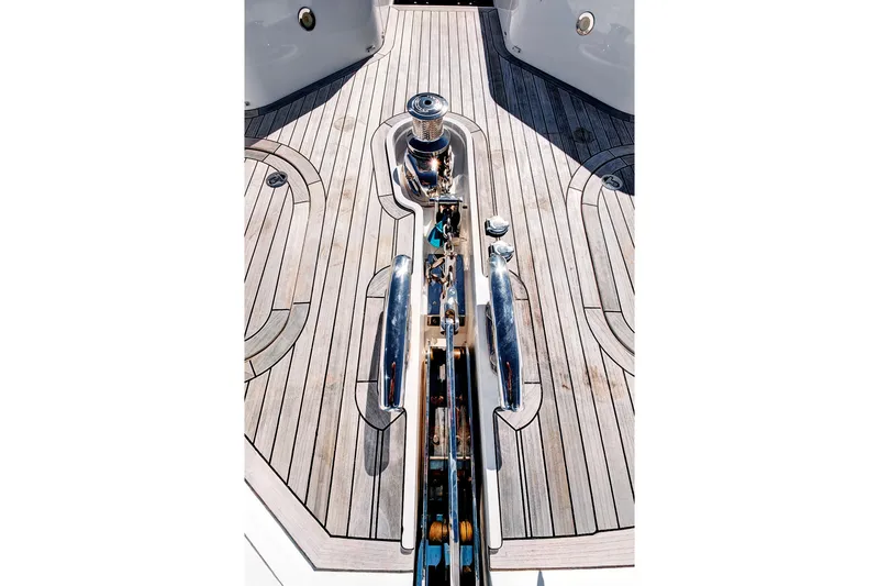 Slide: The Image of Deck of 2024 Sunseeker 76 Yacht with polished fittings and wood finish. - 38