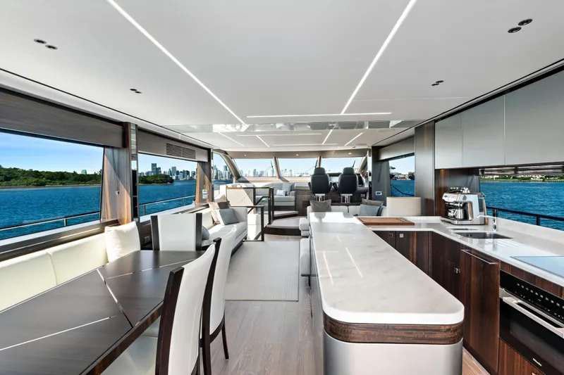 Slide: The Image of Luxurious interior of 2024 Sunseeker 76 Yacht with modern kitchen and scenic ocean views. - 40