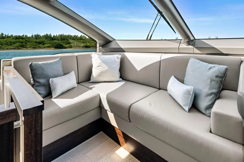 Slide: The Image of Luxurious seating area on 2024 Sunseeker 76 Yacht with plush cushions and scenic view. - 42