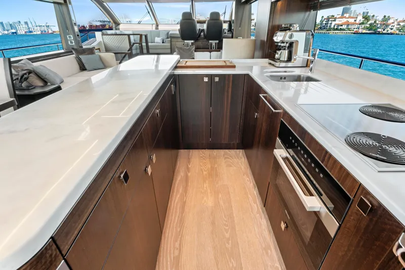 Slide: The Image of Luxurious interior of 2024 Sunseeker 76 Yacht with modern kitchen and ocean view. - 43