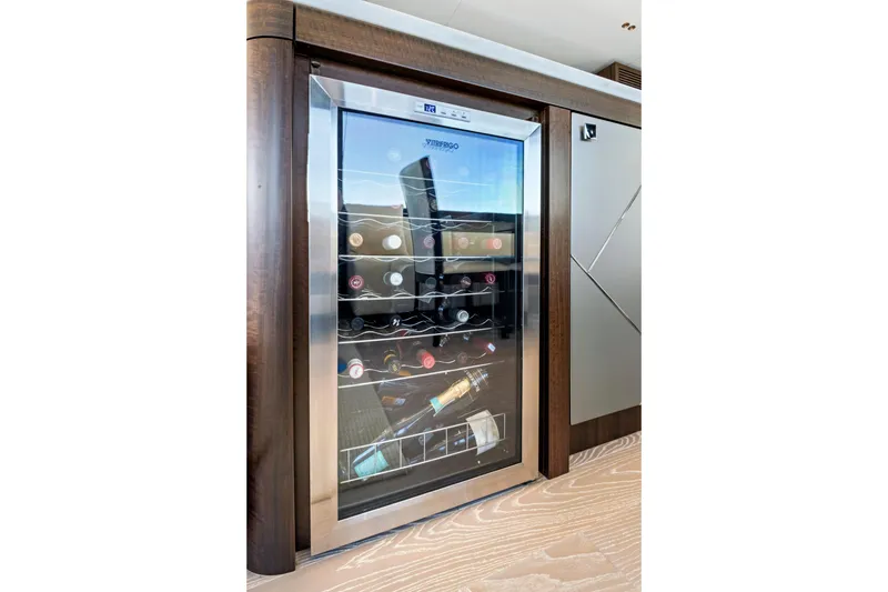 Slide: The Image of Wine cooler on 2024 Sunseeker 76 Yacht, showcasing luxury interior design. - 53