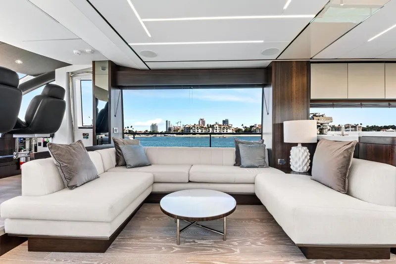 Slide: The Image of Luxurious interior of 2024 Sunseeker 76 Yacht with elegant seating and waterfront view. - 57