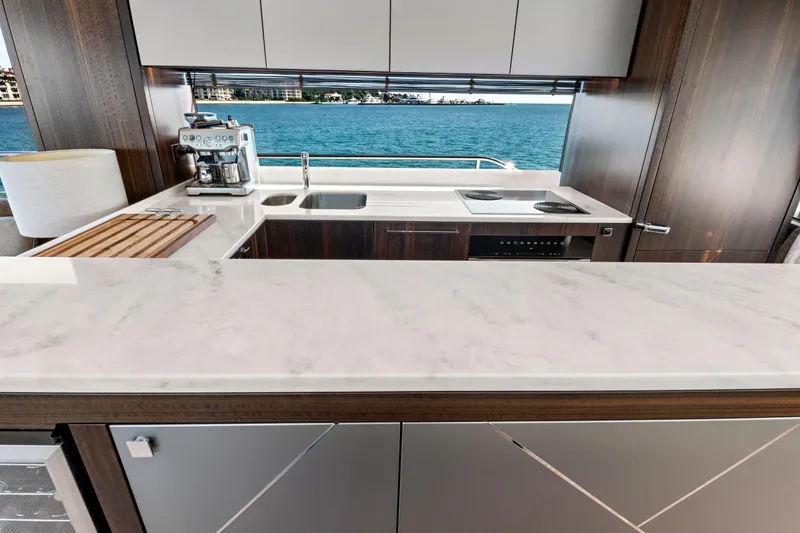 Slide: The Image of Luxurious kitchen interior of 2024 Sunseeker 76 Yacht with ocean view. - 60