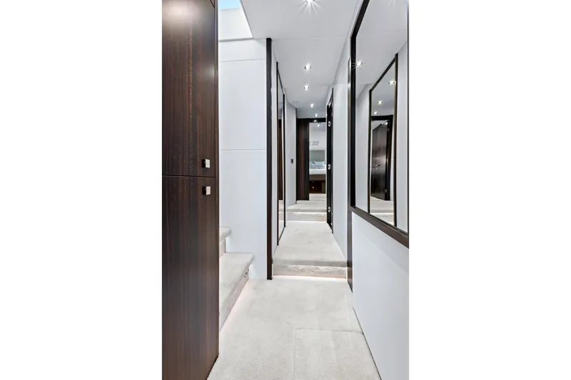 Slide: The Image of Luxurious interior hallway of 2024 Sunseeker 76 Yacht with modern design elements. - 64